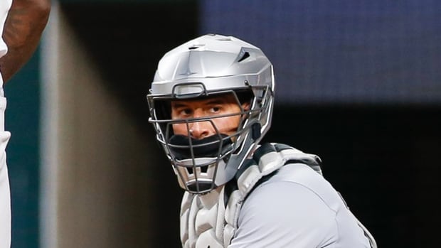 Aug 2, 2023; Arlington, Texas, USA; Chicago White Sox catcher Seby Zavala (44) looks over to the dugout during the fourth inning against the Texas Rangers at Globe Life Field. Mandatory Credit: Andrew Dieb-USA TODAY Sports  